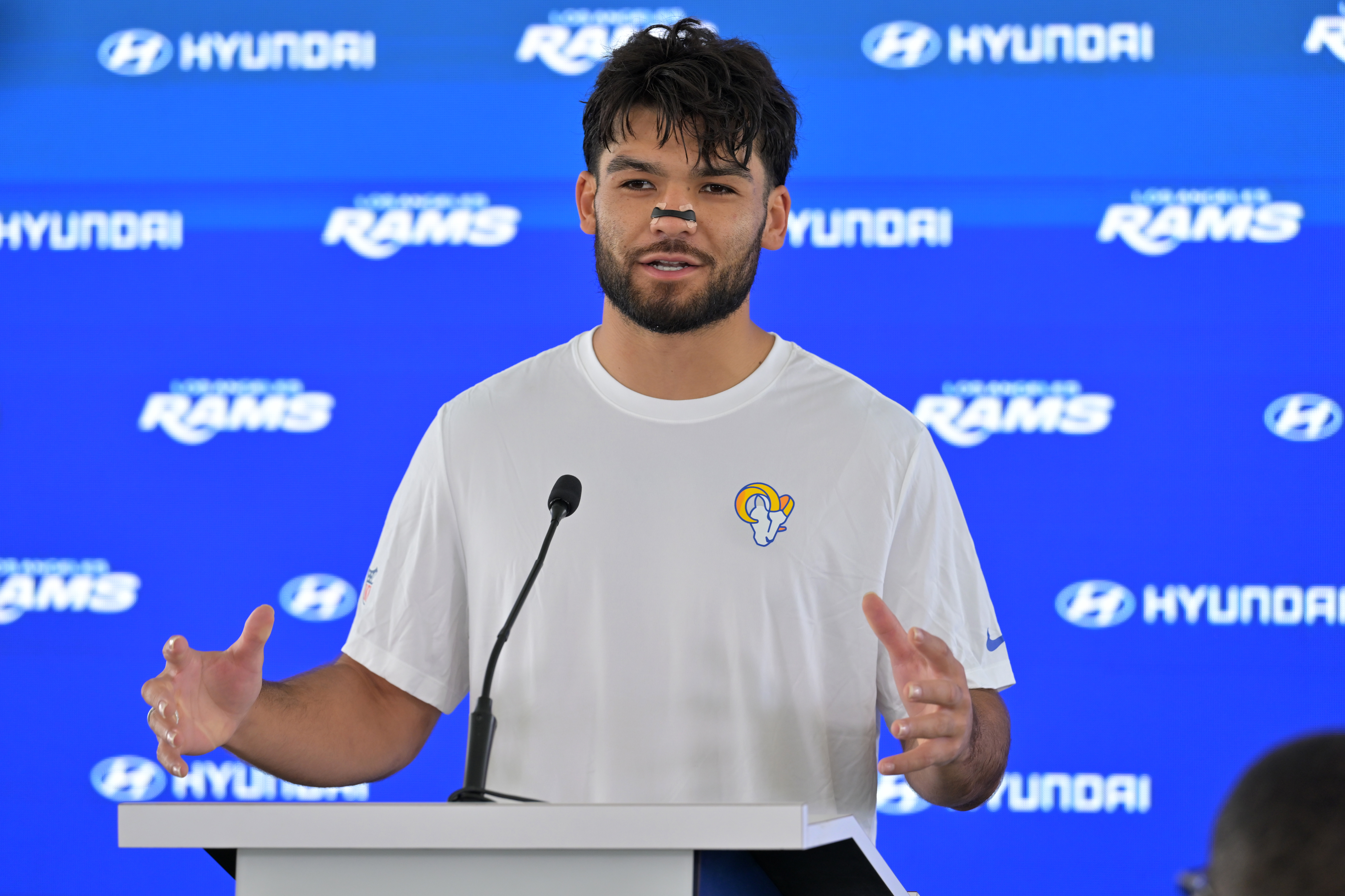 AP26148823791863 Rams wide receiver Puka Nacua speaks to the media following the team’s OTA practice on Thursday in Woodland Hills. JAYNE KAMIN-ONCEA / AP