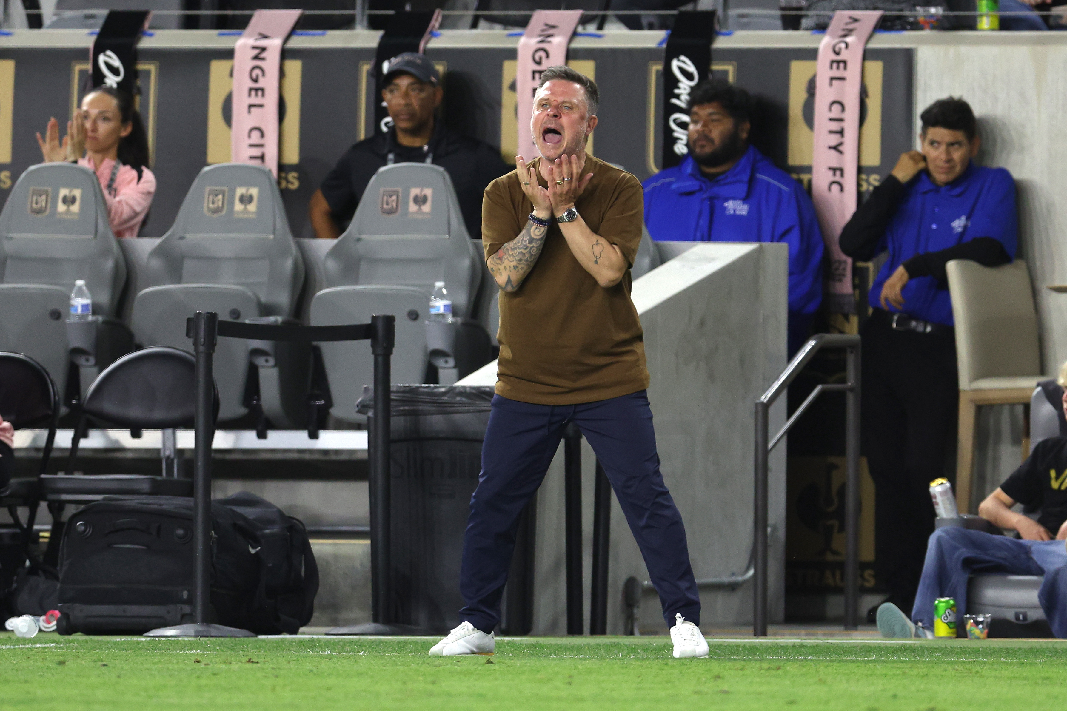 Angel City FC head coach Alexander Straus, center, reacts on the sideline during the second half against the Kansas City Current on May 20, 2026, at BMO Stadium. (Photo by Raul Romero Jr., Contributing Photographer)
