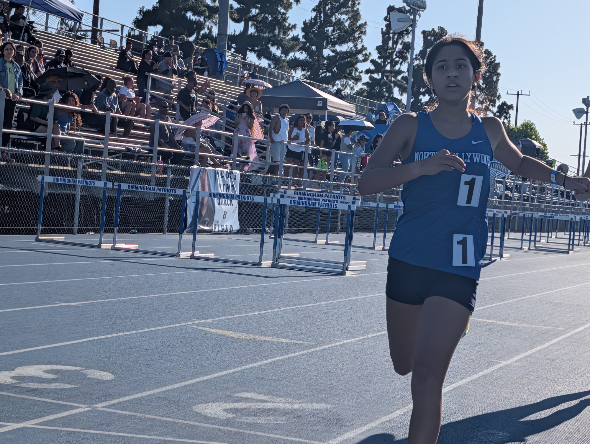 North Hollywood senior Ananya Balaraman crosses the finish line after running the 1,600 meters during the CIF LA City Section Track & Field finals in Lake Balboa, Calif on Thursday, May 21, 2026.  (Ethan Hanson photo)

